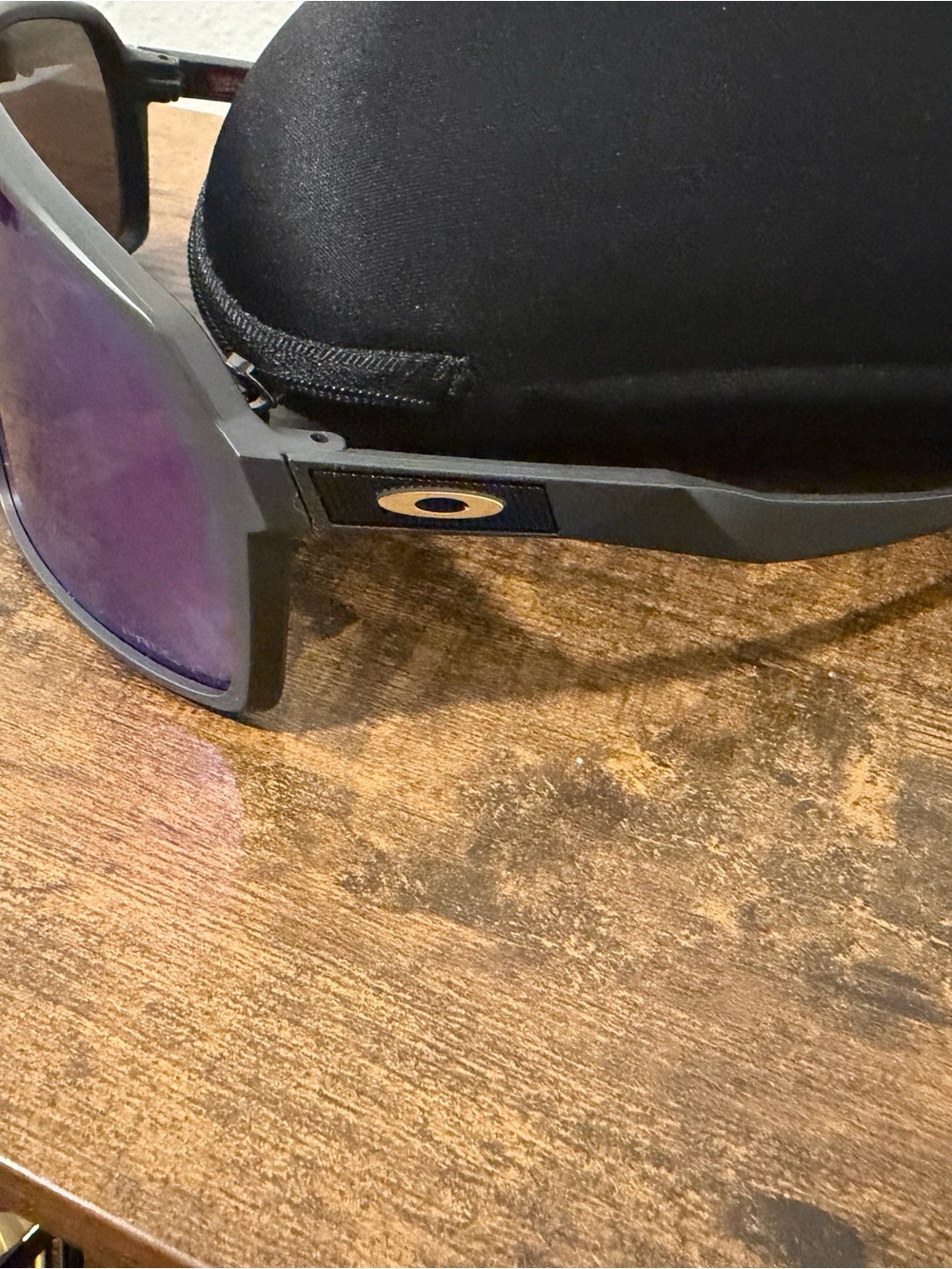 Oakley Matte Black Frame Sunglasses with Purple Lenses